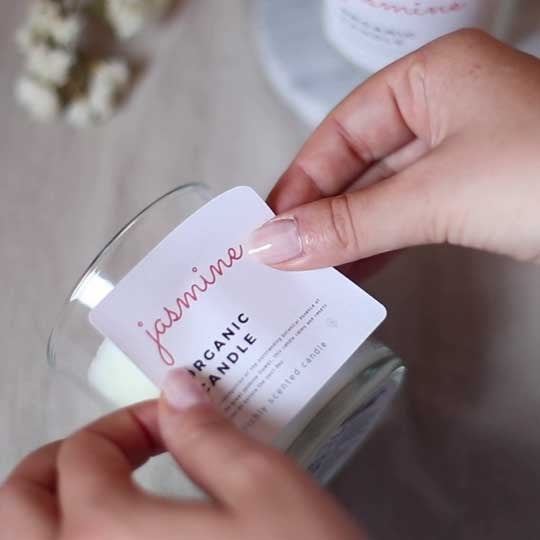 applying label candle holder