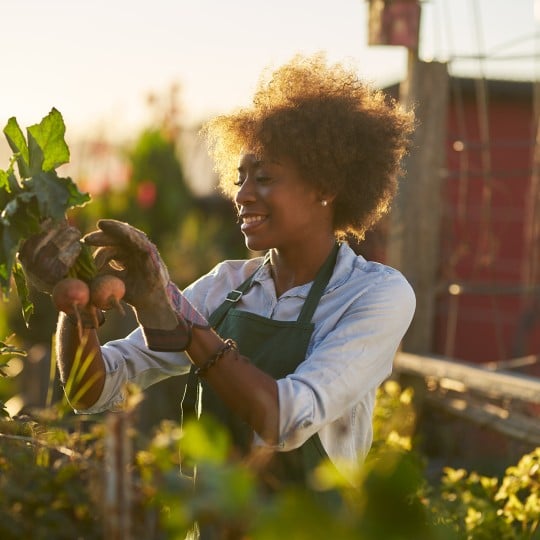 Avery Green Month 2021_Lady gardening growing plants