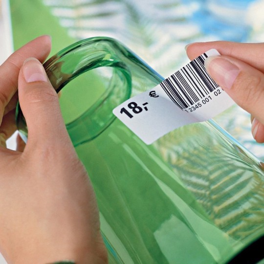 Label being removed off of bottle