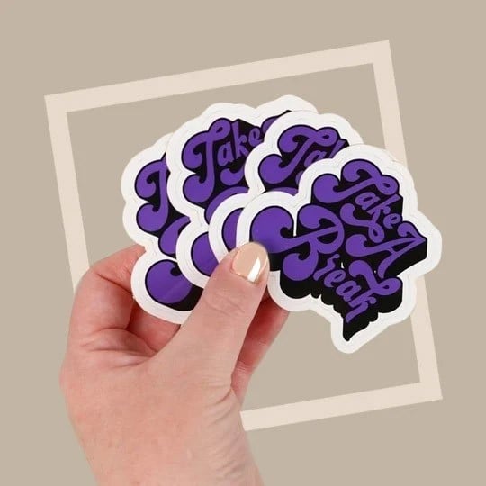 Custom Die Cut Stickers in hand