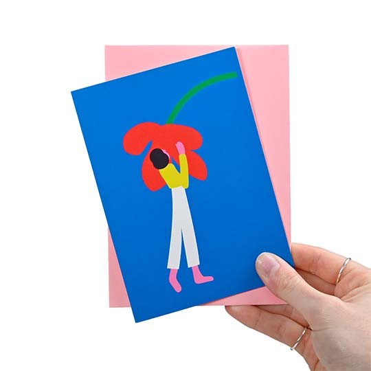 custom printed greeting card with abstract image in hand