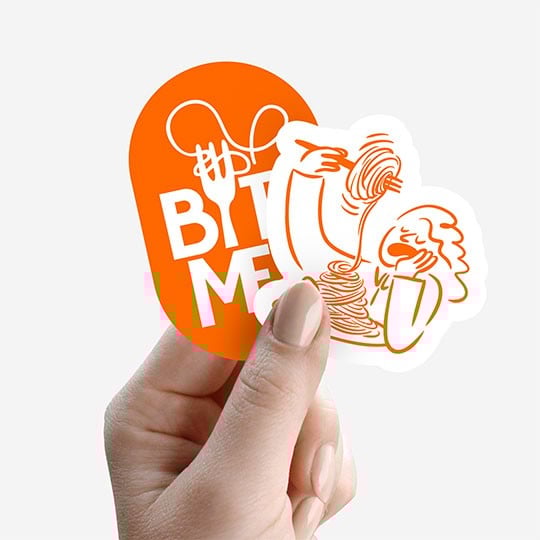 Hand holding single cut sticker