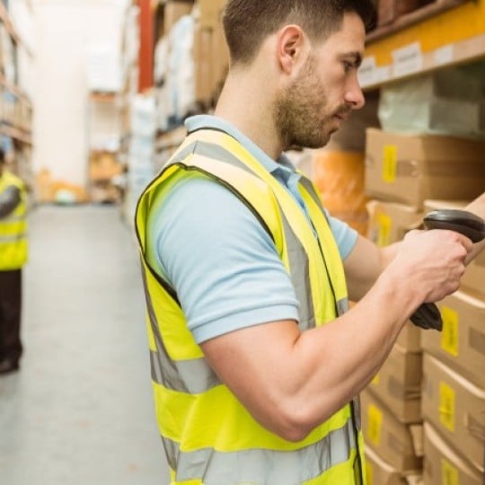 man scanning label in warehouse
