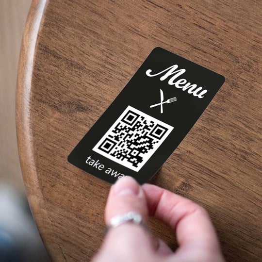 applying qr menu sticker table