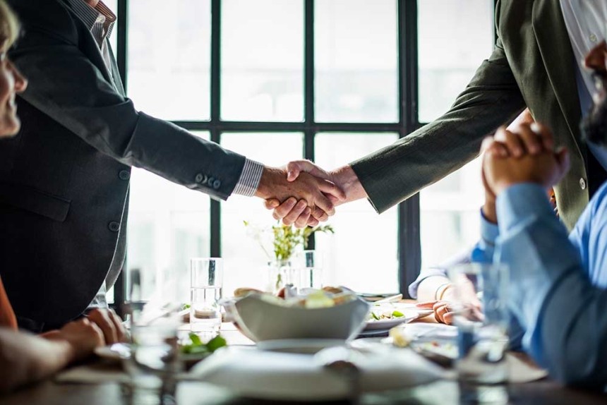 Franking Business Shaking Hands