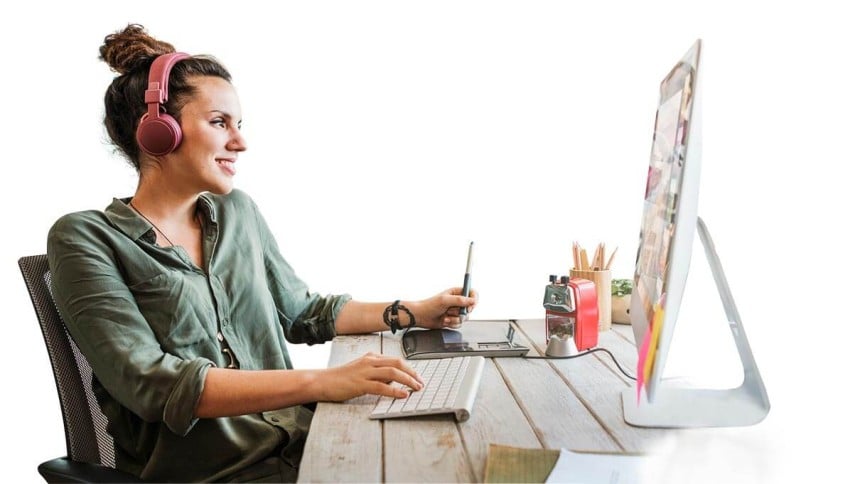 Woman at desk designing on a computer