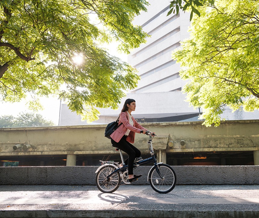 Avery Green Month 2021_Girl on bike green trees