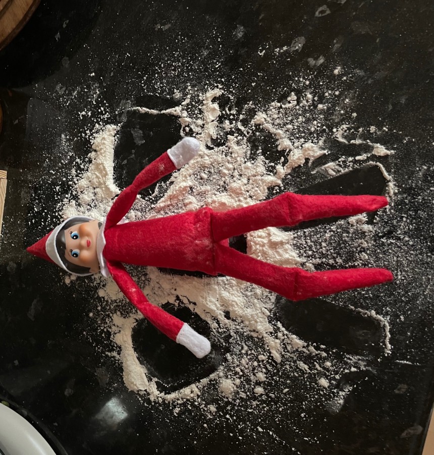 Elf on the Show making a Snow Angel