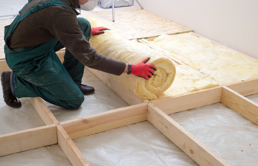 Avery green blog Man rolling Insulation
