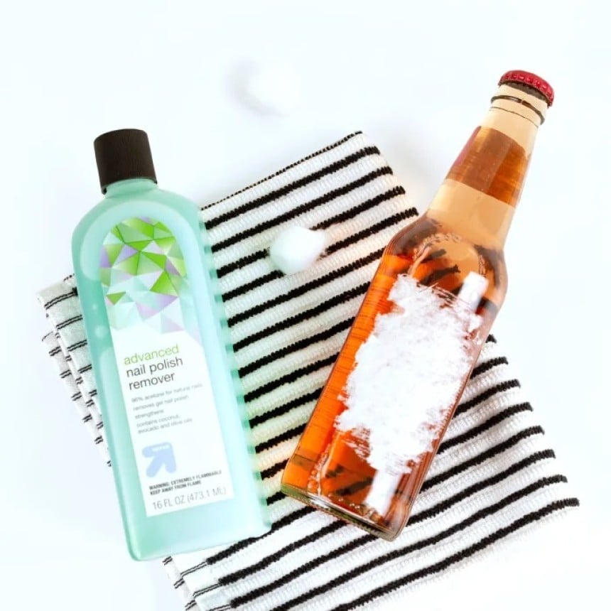 Bottle of nail polish remover and stubborn label