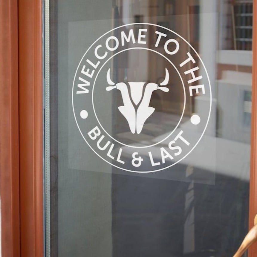 Round clear window sticker restaurant bull and last