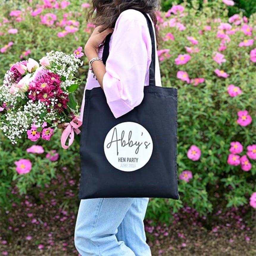 Fabric transfer paper ironed onto a tot bag girl walking