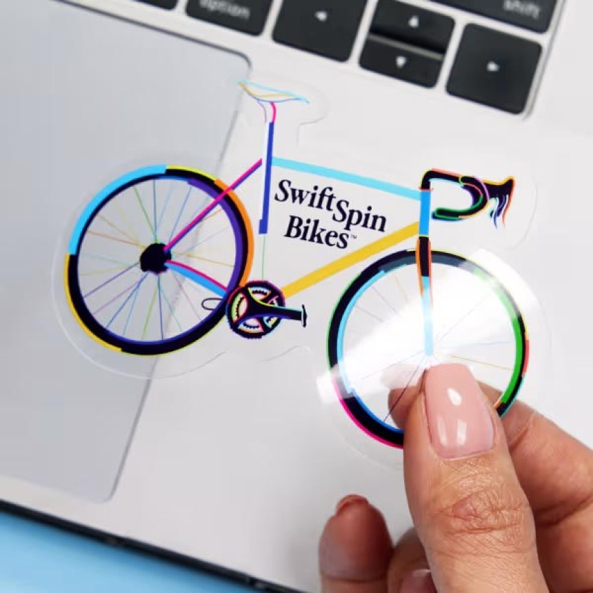Glossy clear sticker of a bike on laptop