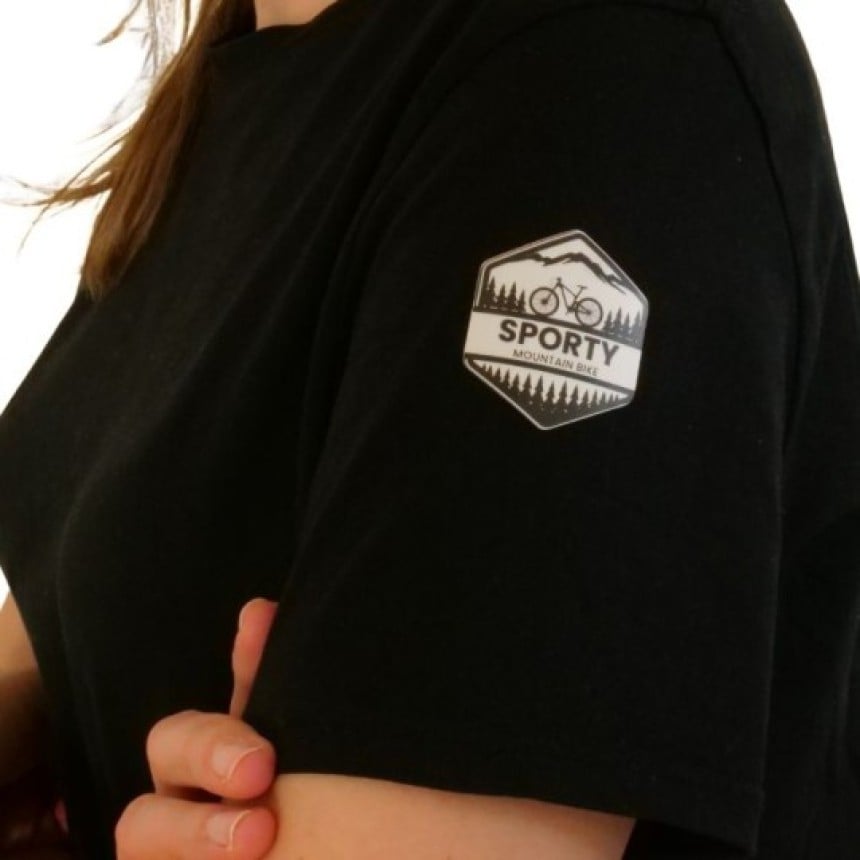 Hexagonal fabric sticker on black t-shirt sleeve