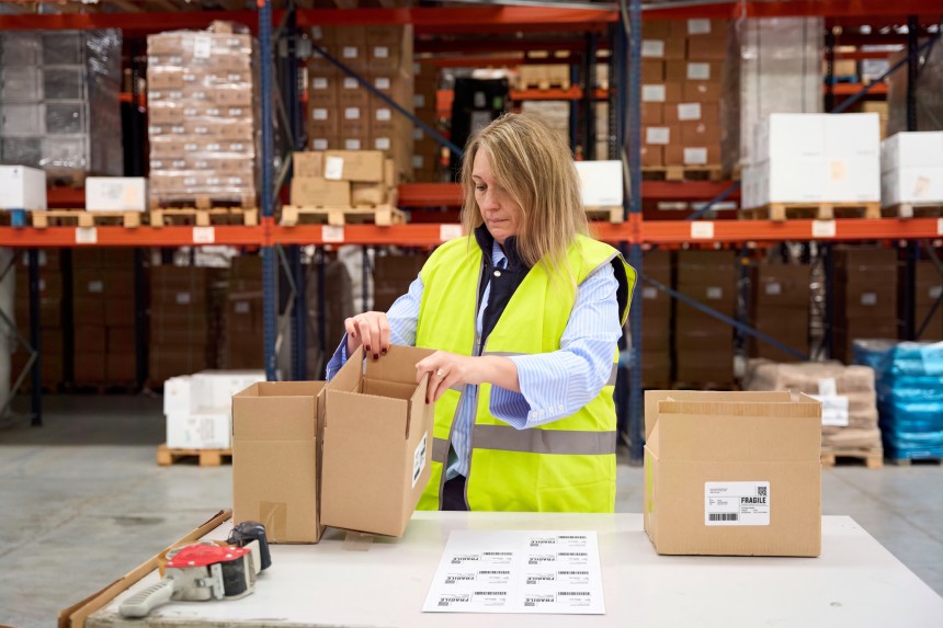Woman packaging box