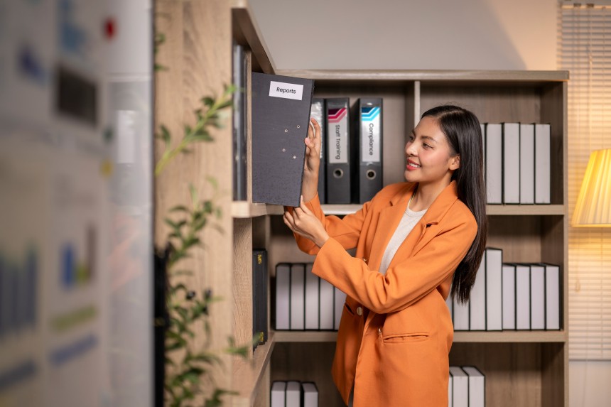 Woman reviewing files