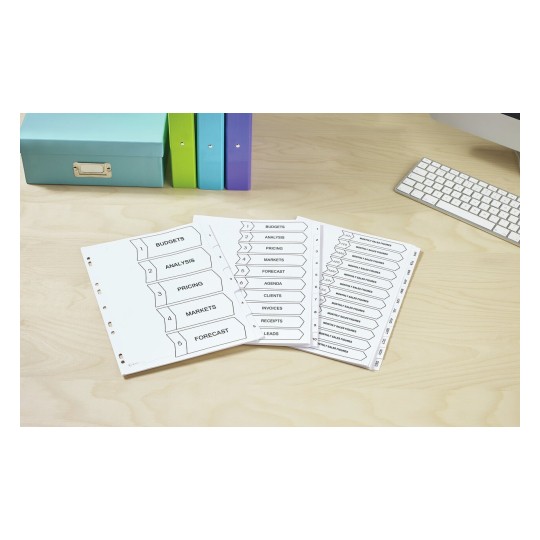 The image shows a workspace with organized documents labeled as 'Budgets', 'Analysis', 'Pricing', 'Markets', and 'Forecast'. There are colorful binders in the background, and a keyboard is visible on the right side.