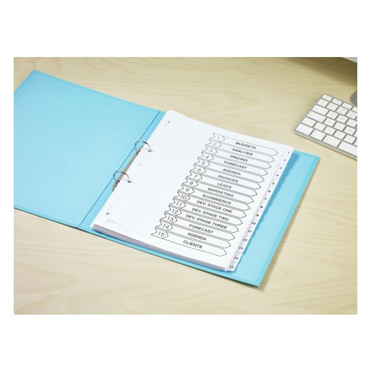 The image features a binder with various labeled sections such as budgets, analysis, pricing, and marketing. The binder is on a light wooden surface near a keyboard.