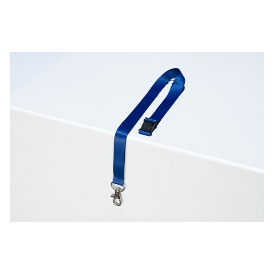 The image shows a blue lanyard with a clasp resting on a white surface. The lanyard has a smooth texture and a buckle feature.