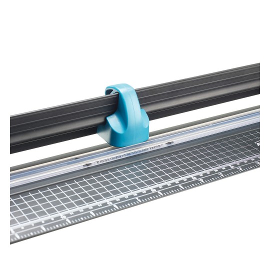 The image shows a paper cutter, featuring a blue clamp handle, black cutting bar, and a grid marked base for alignment. This tool is used for cutting various materials like paper and card stock accurately.