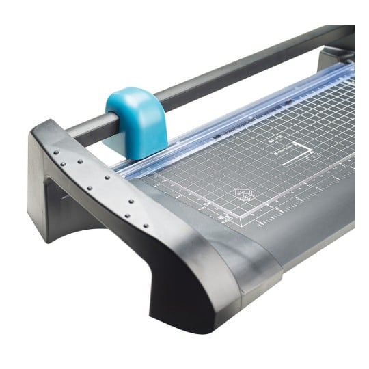 This image features a paper trimmer, showing its cutting surface, grid lines, and handle mechanism. The design is sleek, with a blue component and a durable base for precise cutting.