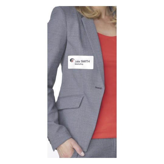 The image features a woman wearing a gray suit jacket over a red top. She has a name tag that reads 'Julia SMITH' and includes the word 'Marketing'.