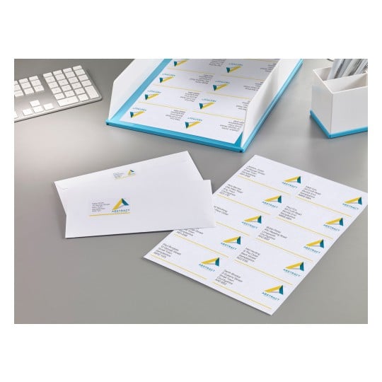 The image shows stationery, an envelope, and an organizer, all with the same company logo and address labels. The design is modern and stylized, with a color palette of blue and yellow.