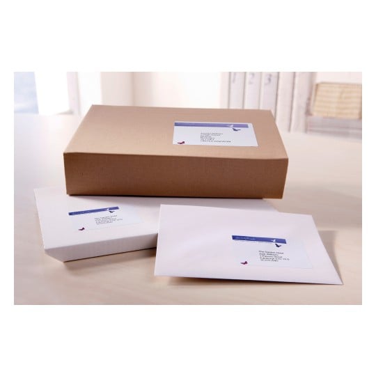 The image shows various shipping packages, including a brown box, a white box, and a white envelope, all with address labels.