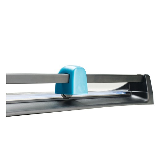 The image shows a close-up of a paper cutter, featuring a turquoise safety guard at the top and a blade for slicing paper. Its design emphasizes precision and safety, making it suitable for crafting or office use.