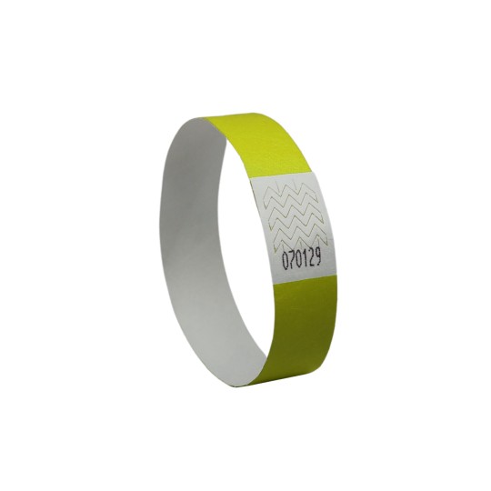 The image shows a green wristband with a white section in the middle displaying a zigzag pattern and a number.