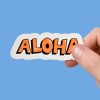 Summer Stickers aloha held in fingers