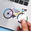 Glossy clear sticker of a bike on laptop