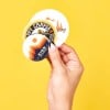 round stickers in hand