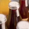 juice bottle with round lollipop lid seal label
