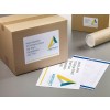 The image displays a cardboard package with a shipping label addressed to Nigel Hawkins, along with a paper document featuring another address and the logo of 'Abstract Architecture.' A cylindrical tube is also visible in the background.