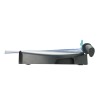 The image shows a side view of a paper cutter, featuring a black base, a blue handle, and a clear cutting guide.
