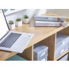 The image features a desk with a laptop, two labeled binders titled 'Our Insurance' and 'Utility', small potted plants, and decorative storage boxes, creating a tidy workspace.