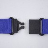 The image shows a blue strap with a black plastic buckle. The buckle is partially unlatched, indicating it can be closed tightly. The background is white, emphasizing the components of the strap.