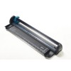 This is a paper cutter with an adjustable guide and a metal cutting blade. It features a black design with a blue button.