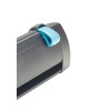 The image shows a close-up of a black object with a blue handle, possibly a tool or device featuring a sliding mechanism.