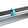 The image shows a paper trimmer featuring a blue clamp handle on a cutting surface marked with grid lines. The design emphasizes precision, commonly used for cutting paper neatly.