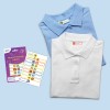 The image shows two collared polo shirts, one light blue and one white, with clothing labels featuring various animal designs. Additionally, there is a pack of home and family labels displayed alongside the shirts.
