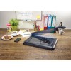 The illustration shows a desk with a letter opener, a cup of coffee, a plate of cookies, a phone, and well-organized documents. There is also a potted plant and a whiteboard with annotations.