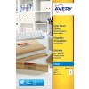 This is an image of Avery transparent shipping labels. The labels are suitable for inkjet printing and almost disappear when applied. There are several brown-wrapped packages visible on the table.