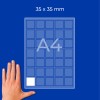 A4 sheet grid of 35×35 mm squares with one white square and a hand at bottom left