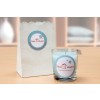 In the image, we see a decorative candle in a glass holder, next to a paper bag with the Deco House logo and the text 'Decorational Items & Gifts'.