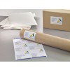 The image features a cardboard tube with an address label, a box, and several sheets of paper. The labels show names and addresses, indicating they may be for mailing purposes. There are organizational elements related to a company called 'ABSTRACT Architecture.'