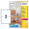 This image shows a package of Avery shipping labels. It includes a clear label with the number 2 and information about the labels, including that they are opaque and suitable for laser printers. There is also an image of a person attaching a label to a package.