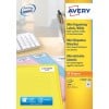 The image shows mini organizational labels from the brand Avery, along with a keyboard and pens in a holder. The labels are white and are intended for marking files.
