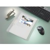 The image shows an electronic document on a table with a translucent surface. There is a metal mouse and keyboard. The document concerns holiday homes.